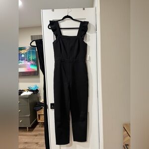 Adelyn Rae Black Jumpsuit with Ruffle Straps